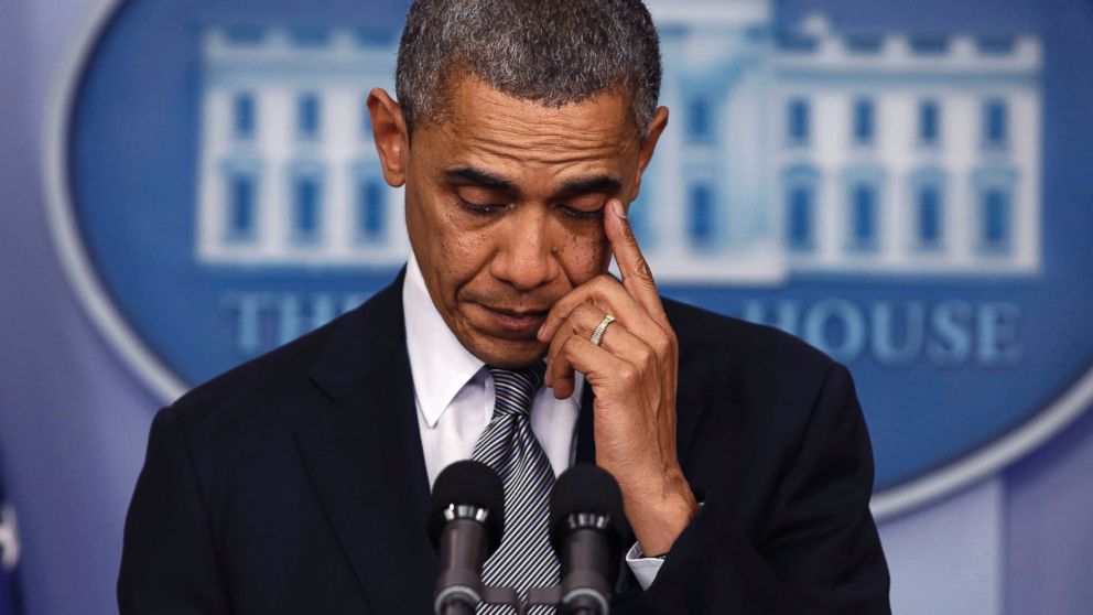 PHOTO: President Obama wipes away a tear as he speaks about the shooting at Sandy Hook Elementary School in Newtown, Connecticut, during a press briefing at the White House, Dec. 14, 2012. 